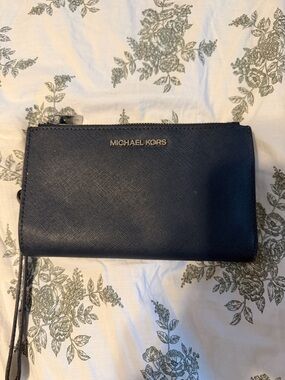 Michael Kors Navy Saffiano Zip Wristlet with silver Logo